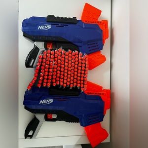 Two Nerf shooters and 140 foam darts